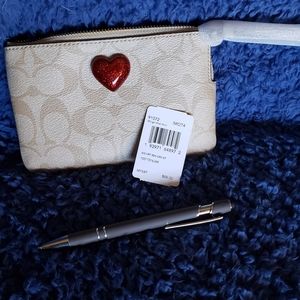 Coach heart wristlet